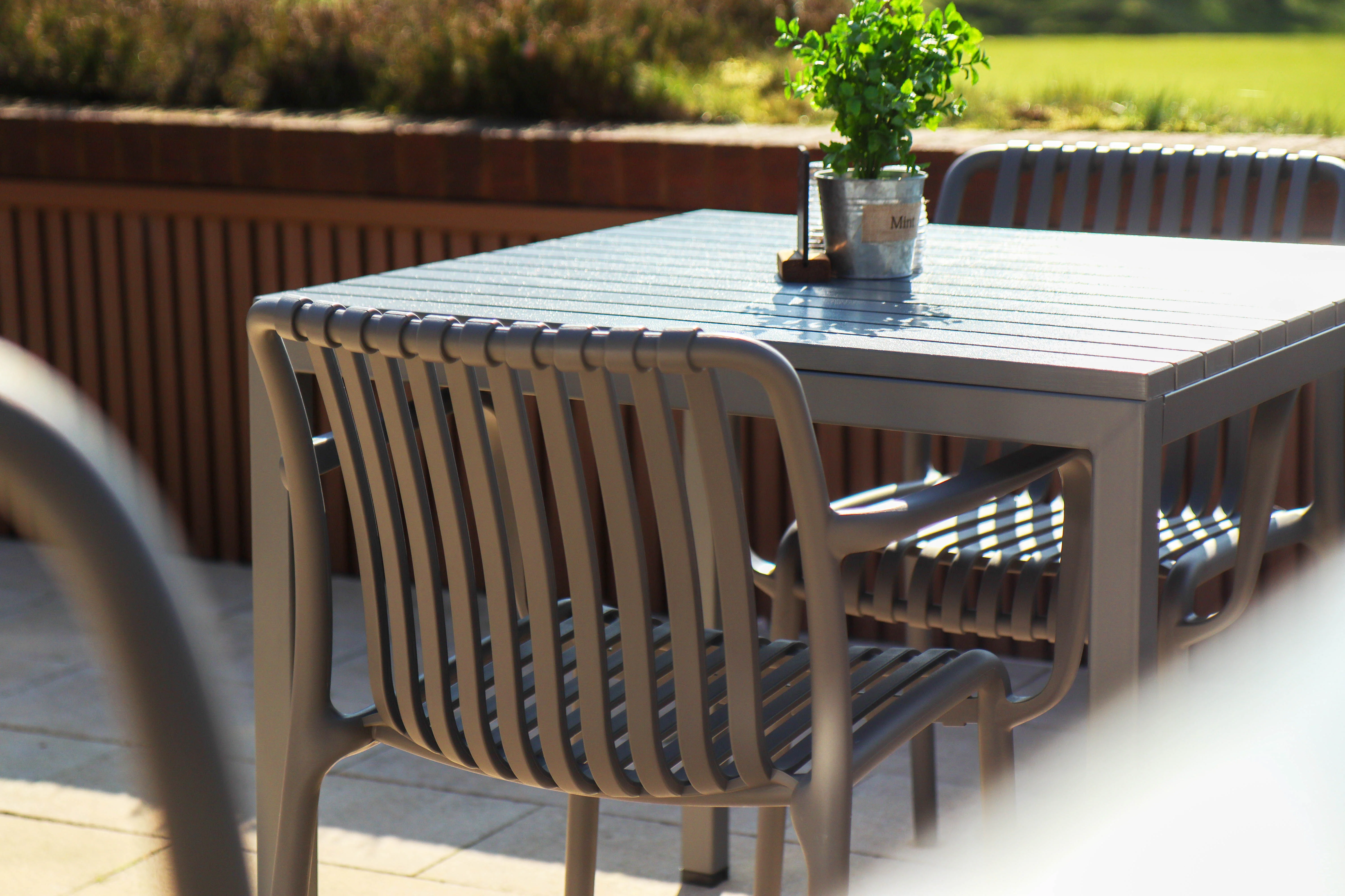Maldives Outdoor Stacking Carver Chair - Image 55